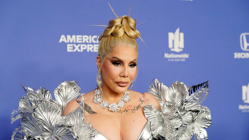 ARCHIVO - Ivy Queen posa en los premios 2023 Billboard Women in Music el 1 de marzo de 2023,...