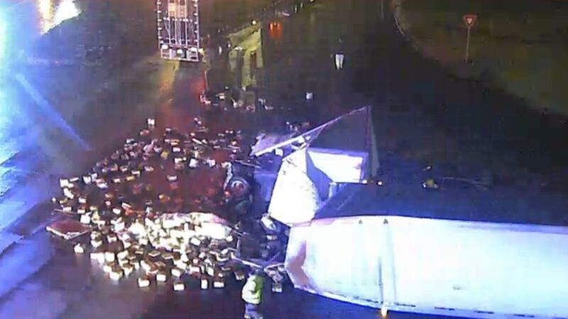 Overturned tractor trailer blocks all lanes on 316 WB at Hurricane Trail.